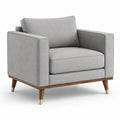 Fauteuil 1 place en tissu gris clair, base en bois brun et détails dorés, 110 × 90 × 85 cm